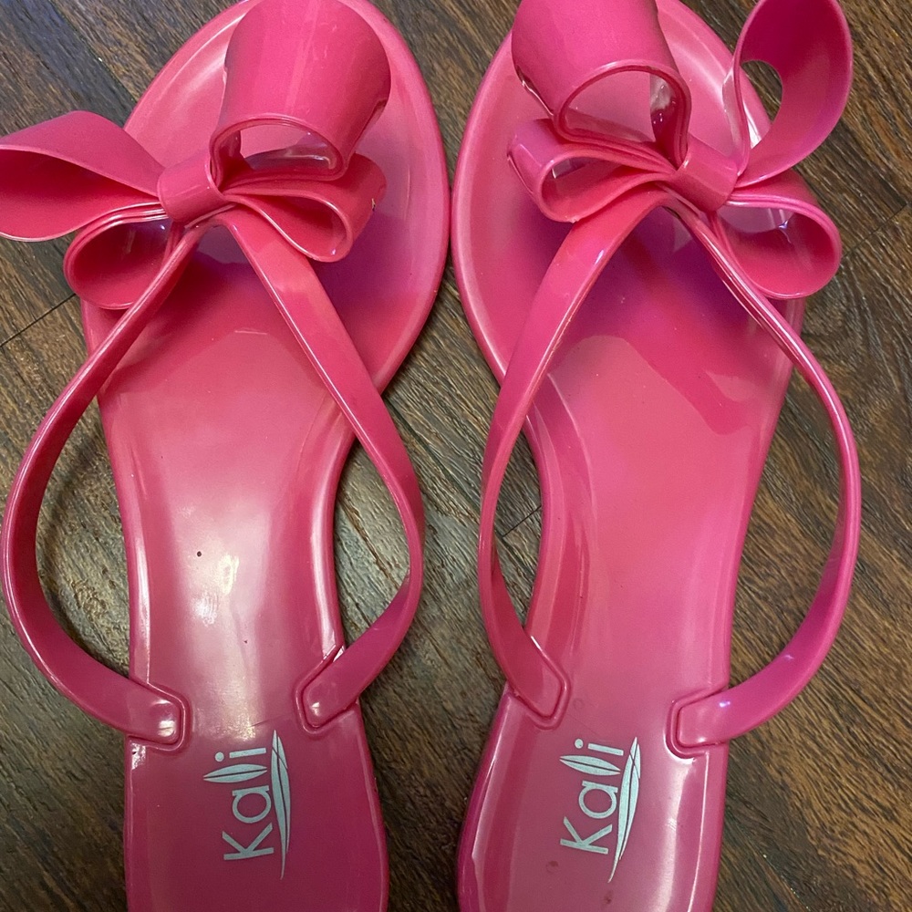 Pink plastic flip flop size 8- worn once